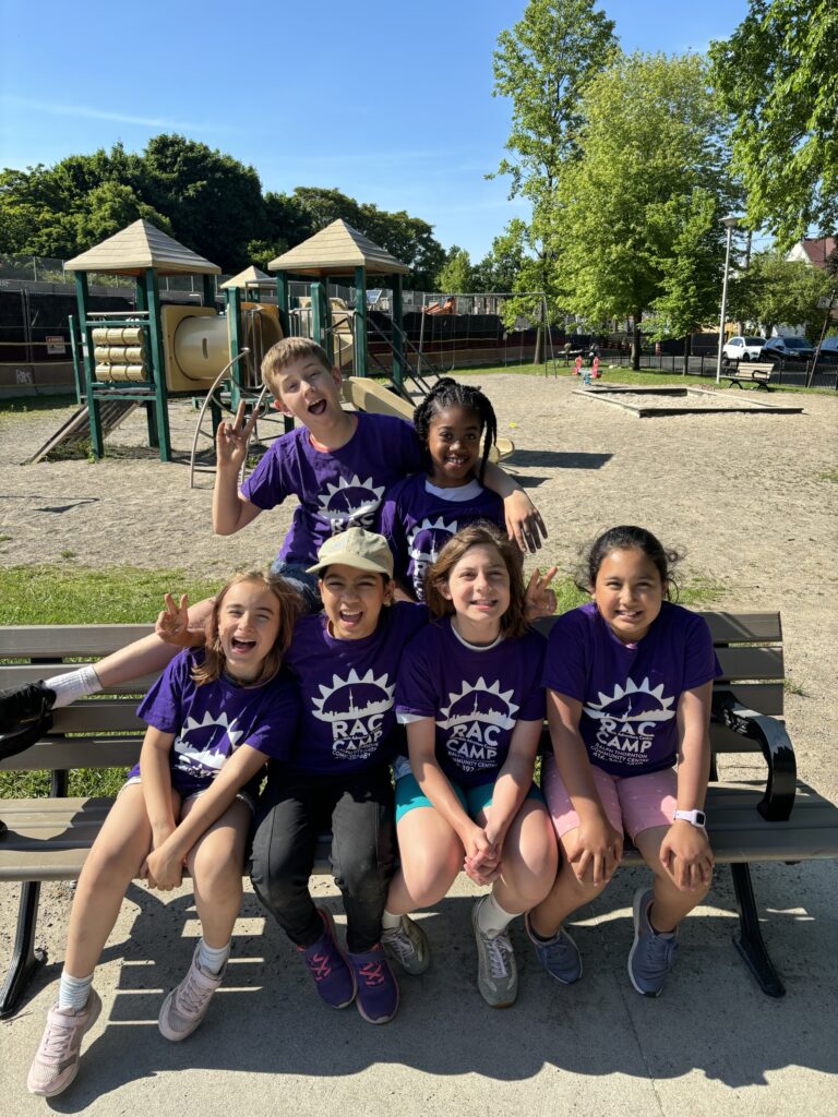 Happy and Smiling Riverdale Adventure Camp Kids at a Park.