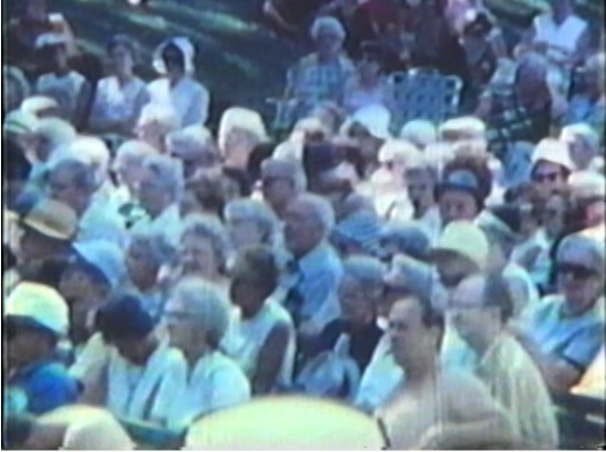 A photo of an outdoor meeting of the Riverdale Community Organization (or RCO) in circa 1960-1970.